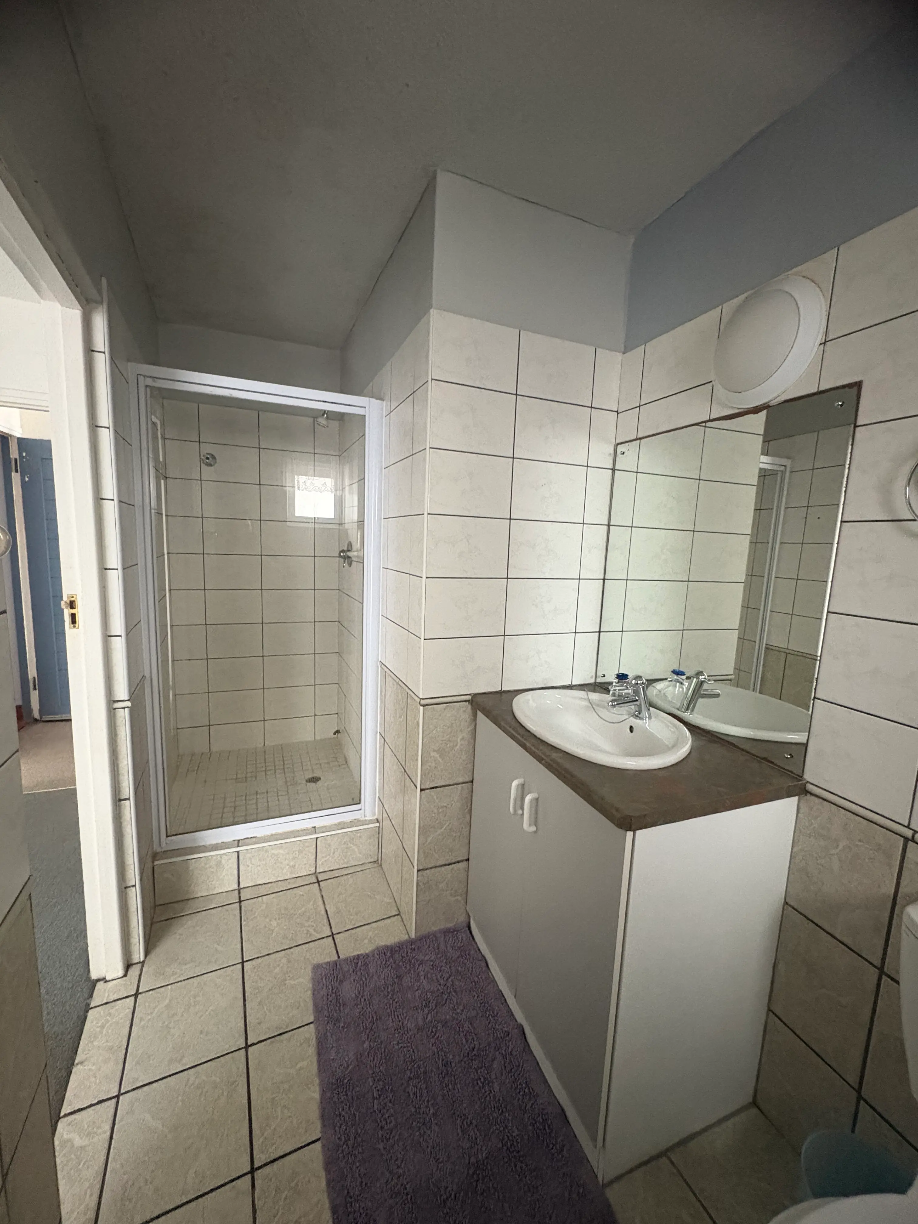 Spare bedroom bathroom view 1